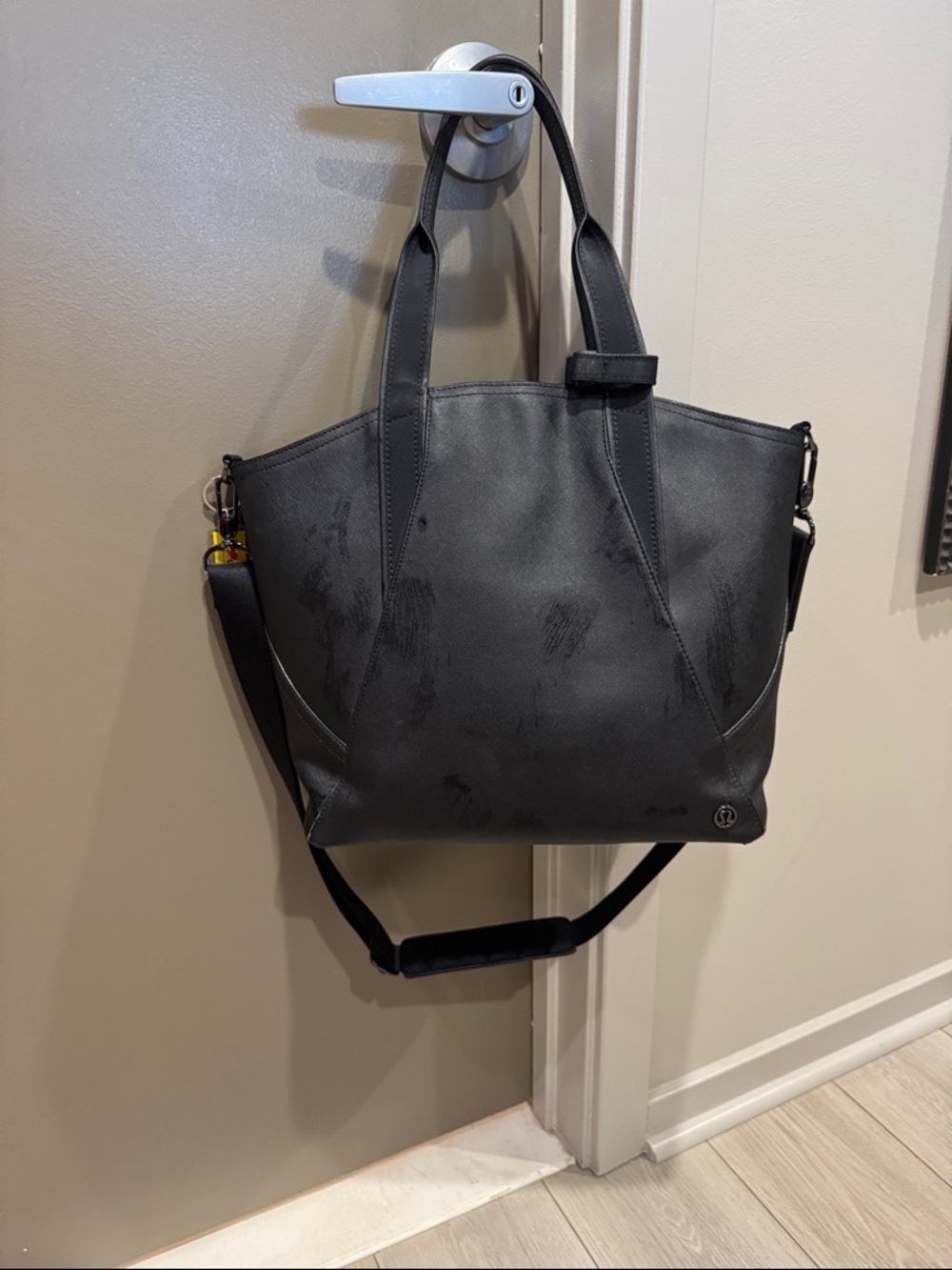 Black Leather Lululemon gymTote with Shoulder Strap. Comes with small makeup bag